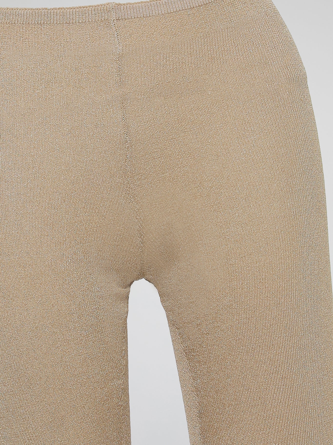 Wrap your legs in luxurious comfort and style with our Beige Knitted Leggings by Roberto Cavalli. Made from the finest quality fabrics, these leggings are expertly designed to provide a seamless fit that sculpts and contours your silhouette flawlessly. Whether you're lounging at home or stepping out for a night on the town, these leggings are the perfect blend of elegance and relaxation.