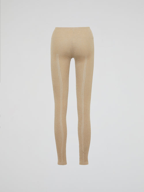 Wrap your legs in luxurious comfort and style with our Beige Knitted Leggings by Roberto Cavalli. Made from the finest quality fabrics, these leggings are expertly designed to provide a seamless fit that sculpts and contours your silhouette flawlessly. Whether you're lounging at home or stepping out for a night on the town, these leggings are the perfect blend of elegance and relaxation.