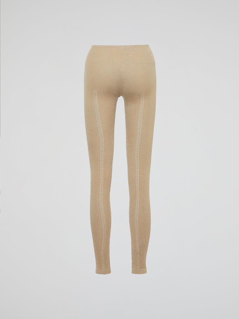 Wrap your legs in luxurious comfort and style with our Beige Knitted Leggings by Roberto Cavalli. Made from the finest quality fabrics, these leggings are expertly designed to provide a seamless fit that sculpts and contours your silhouette flawlessly. Whether you're lounging at home or stepping out for a night on the town, these leggings are the perfect blend of elegance and relaxation.