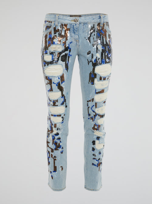 Let your inner rockstar shine with these Sequin Detailed Distressed jeans from Roberto Cavalli. The intricate sequin embellishments add a touch of glamour to the edgy distressed denim, perfect for making a statement wherever you go. Slip into these jeans and unleash your bold, fearless style that is bound to turn heads and spark conversations.