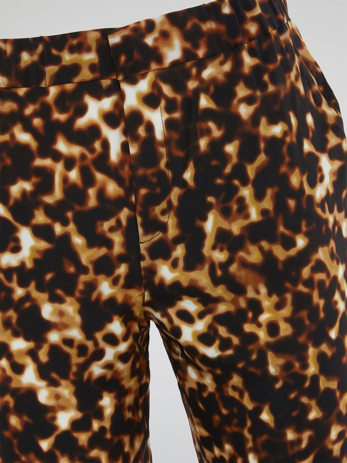 Unleash your inner fierce fashionista with these Leopard Print Elasticated Waist Pants from Roberto Cavalli. Made for the bold and the fearless, these pants exude confidence and style in every step. Elevate your wardrobe with a touch of wild sophistication and turn heads wherever you go.