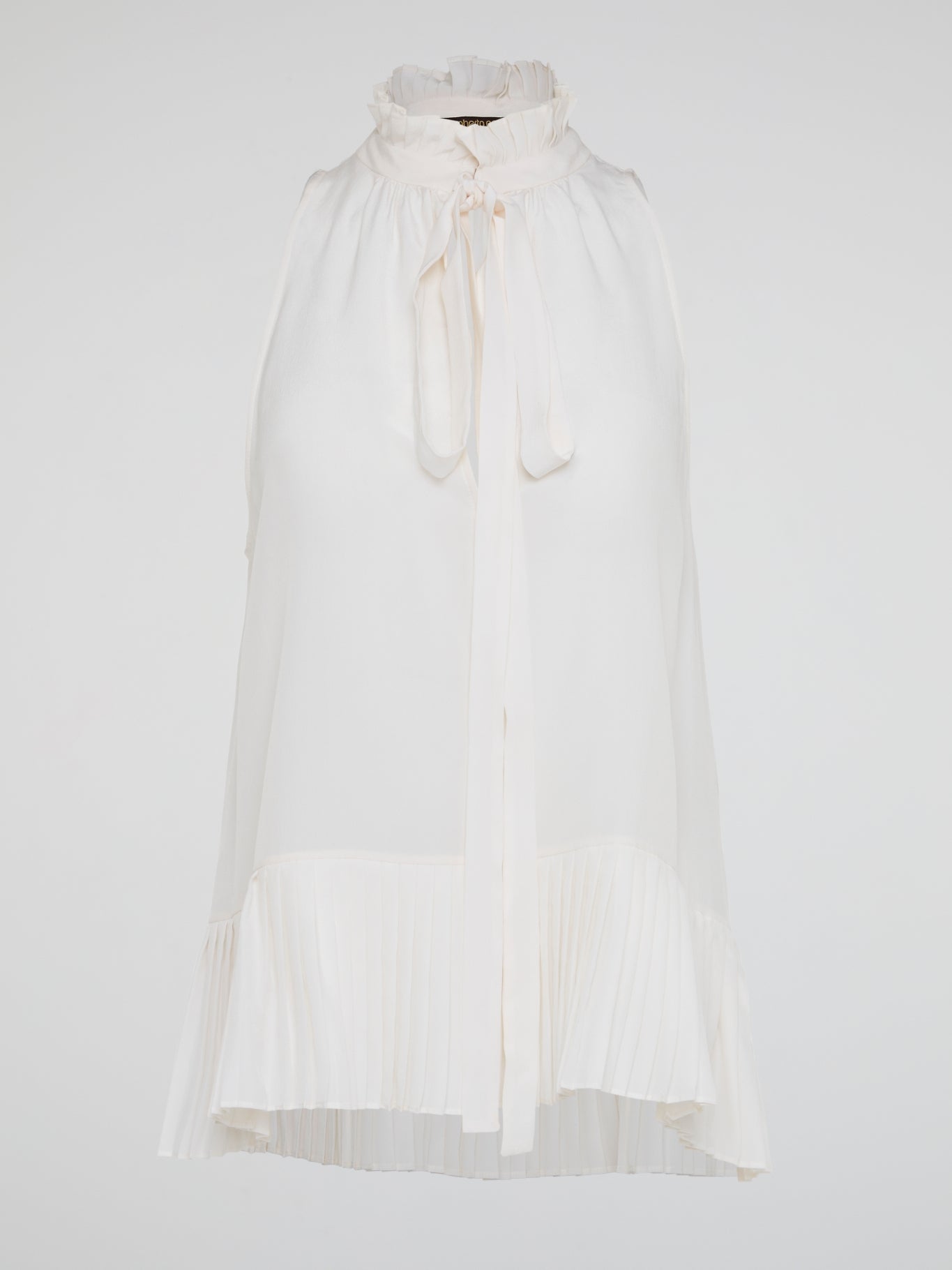 Elevate your summer wardrobe with the White Sleeveless Frill Top by Roberto Cavalli, a chic and feminine piece that exudes effortless elegance. Crafted with impeccable tailoring and delicate frill details, this top is perfect for any occasion, from casual brunches to evening soir茅es. Embrace your inner fashionista and turn heads wherever you go with this must-have addition to your closet.