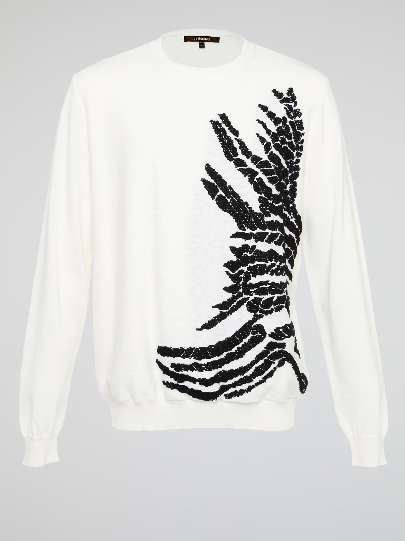 Wrap yourself in pure luxury with this exquisite white embroidered sweatshirt from Roberto Cavalli. The intricate detailing and soft fabric ensure both comfort and style, making it the perfect statement piece for any occasion. Elevate your wardrobe with this timeless and effortlessly chic addition that is sure to turn heads wherever you go.