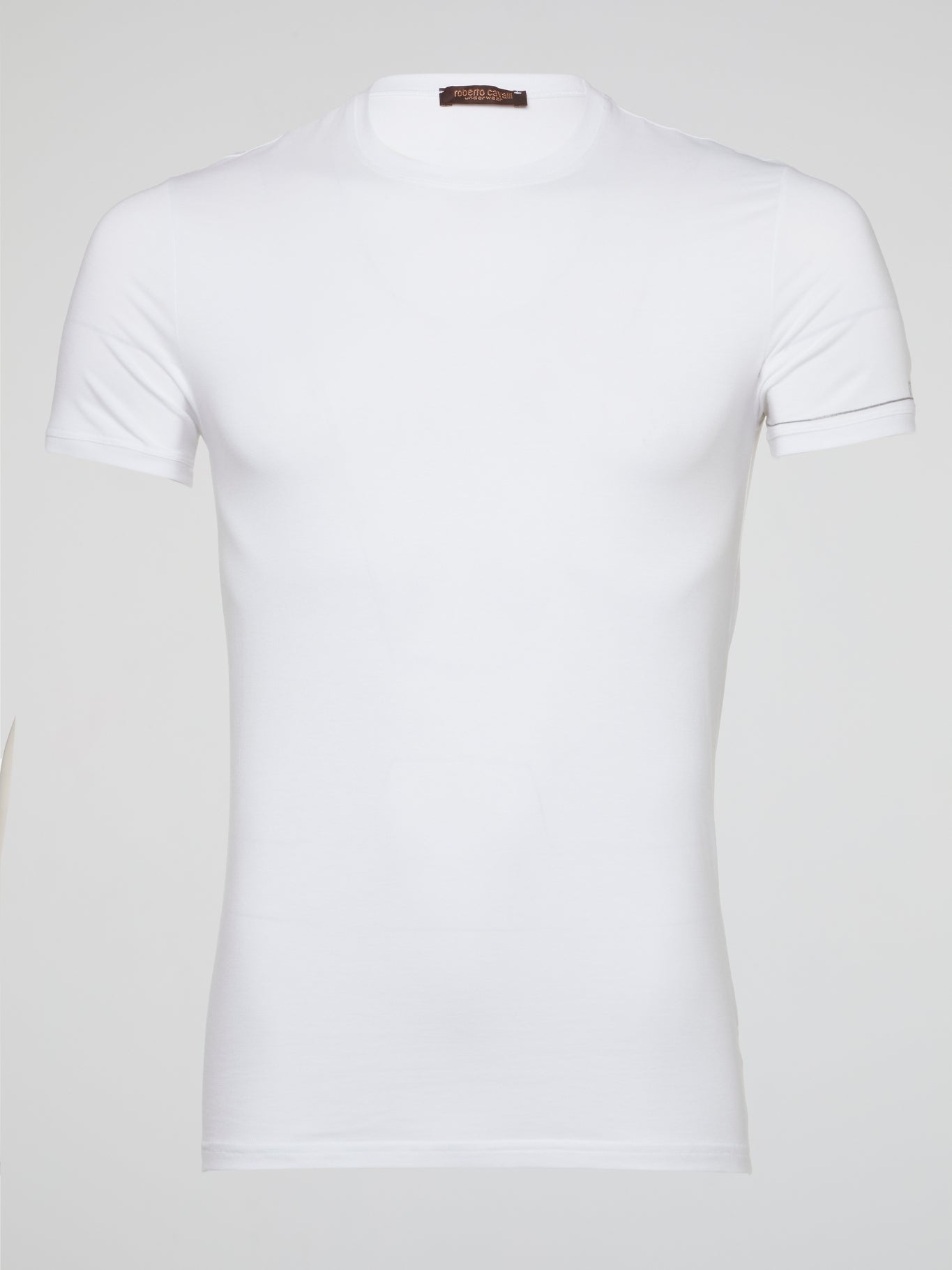 Indulge in luxury with the White Ribbed Trim T-Shirt by Roberto Cavalli Underwear, a sleek and stylish addition to your wardrobe that effortlessly combines comfort and sophistication. Crafted with the finest materials and detailed with ribbed trim, this t-shirt exudes timeless elegance and modern charm. Elevate your everyday look with this must-have piece that promises to make a statement wherever you go.