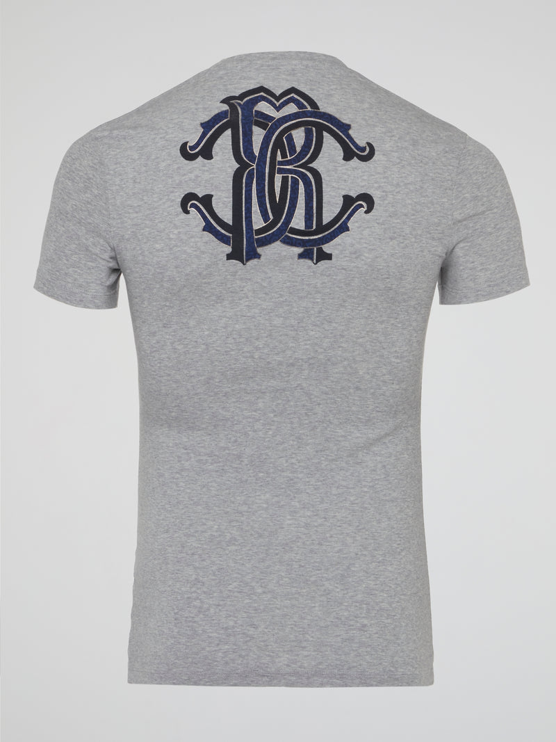 Elevate your everyday style with the effortlessly chic Grey Logo Print V-Neck T-Shirt from Roberto Cavalli Underwear. Crafted from soft, premium materials, this tee features a sleek logo print that adds a touch of luxury to your casual look. Perfect for layering or wearing on its own, this versatile piece will surely become a go-to in your wardrobe.