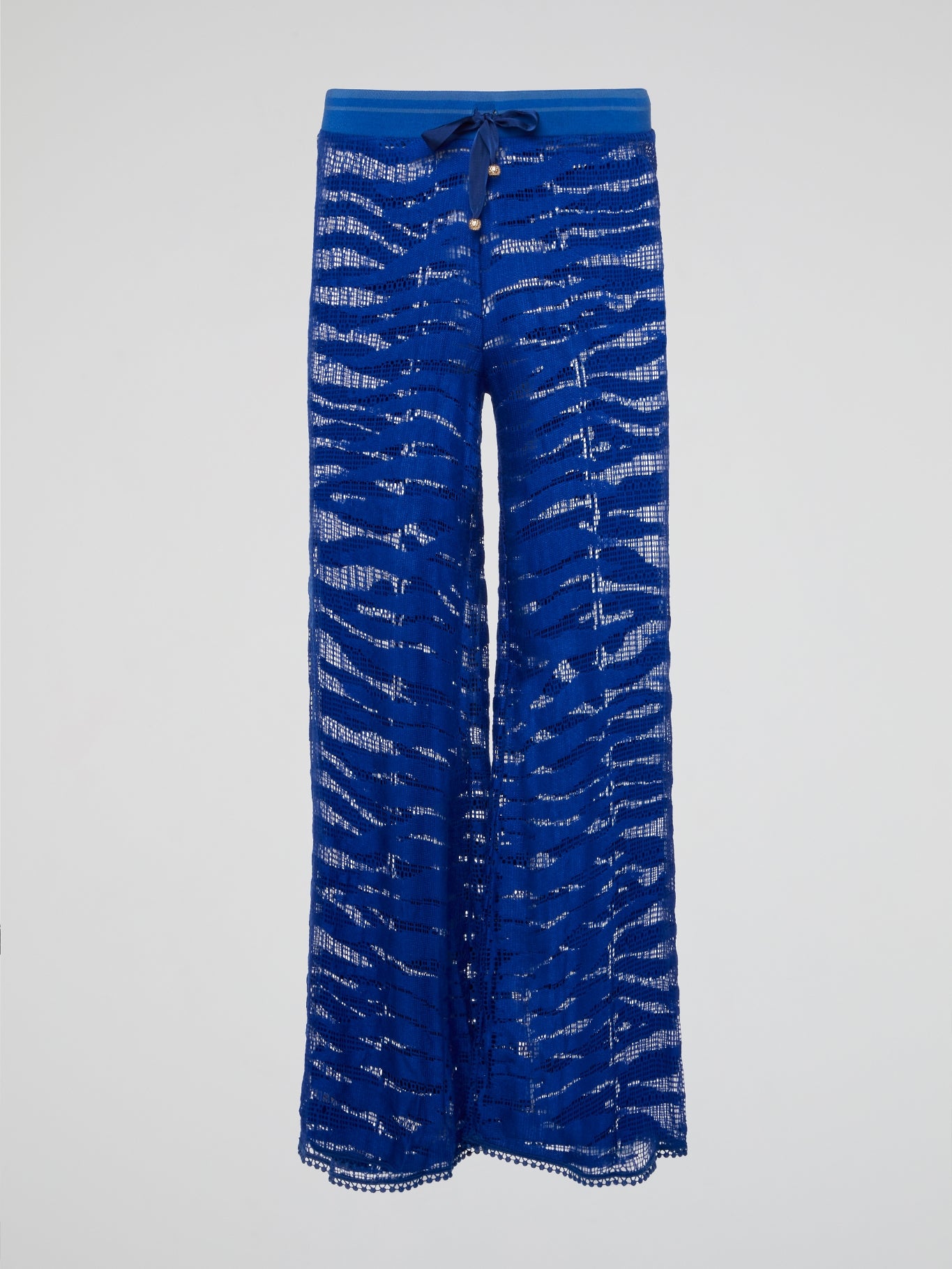 Elevate your everyday style with these stunning Blue Lace Palazzo Pants by Roberto Cavalli. Crafted with intricate lace detailing and a flowing silhouette, these pants are perfect for making a bold fashion statement. Pair them with a simple tank top and some statement jewelry for a chic and sophisticated look that is sure to turn heads wherever you go.