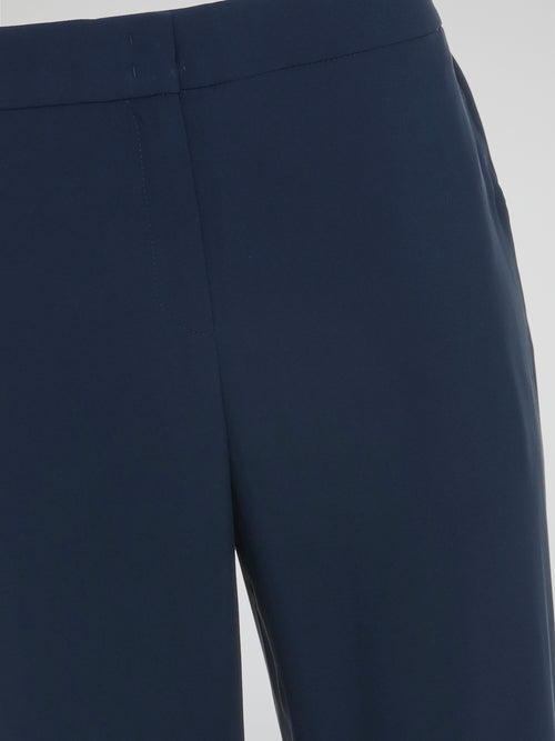 Step into sophisticated style with the Navy Flared Trousers by Akris Punto. Crafted with precision, these pants gracefully hug your curves before flaring out at the hemline, creating an effortlessly elegant silhouette. Pair them with a blouse for a professional look or dress them up with a sleek blazer for a night out on the town.