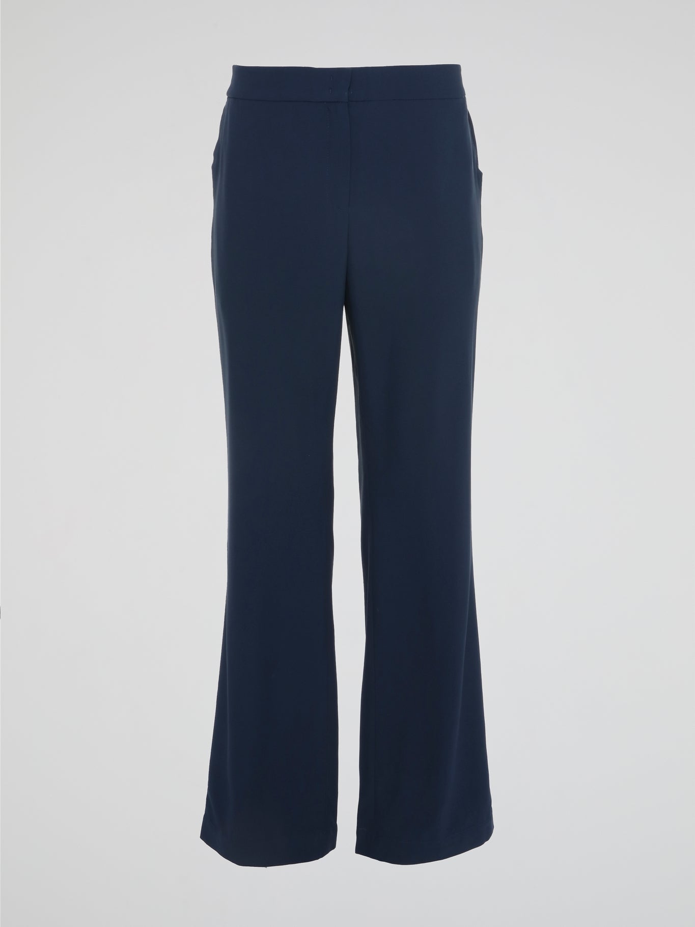 Step into sophisticated style with the Navy Flared Trousers by Akris Punto. Crafted with precision, these pants gracefully hug your curves before flaring out at the hemline, creating an effortlessly elegant silhouette. Pair them with a blouse for a professional look or dress them up with a sleek blazer for a night out on the town.