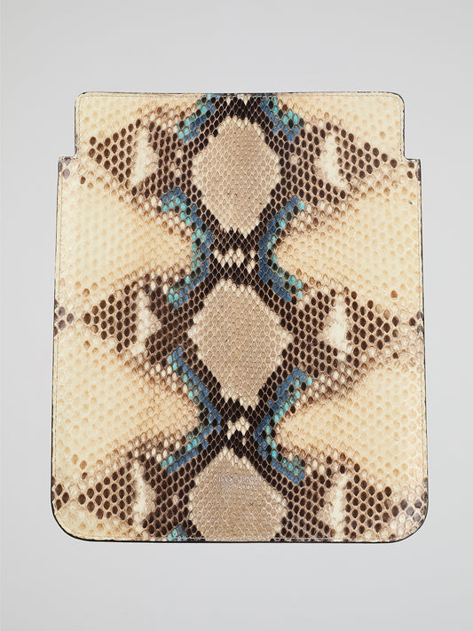 Embrace the wild side of technology with the Roberto Cavalli Snake Print Tablet Cover. This opulent accessory seamlessly combines edgy snake print with the iconic luxury of Roberto Cavalli. Crafted with precision, the tablet cover provides both protection and style, making it the ultimate statement piece for fashion-forward tech enthusiasts.