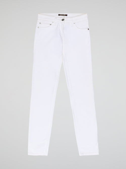 Turn heads and elevate your style with our White Straight Cut Jeans by Roberto Cavalli. Crafted with precision and attention to detail, these jeans feature a sleek and modern design that embodies sophistication and confidence. Whether you're strolling through the city or hitting the beach, these jeans are sure to make a statement and redefine your fashion game.