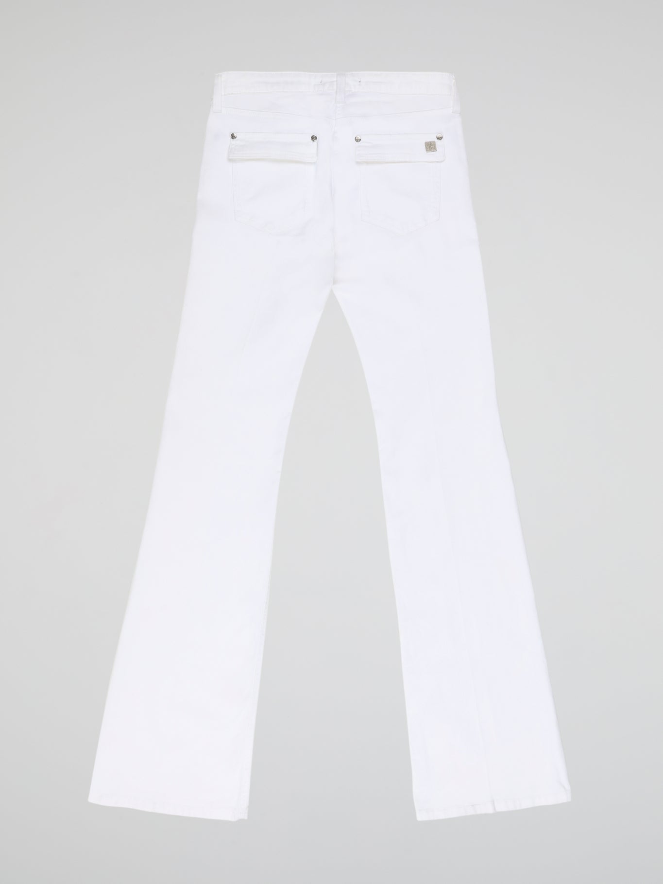 Step into fashion-forward elegance with these White Flared Jeans from renowned designer Roberto Cavalli. Crafted with meticulous attention to detail, these jeans feature a flattering high waistline and a mesmerizing flared silhouette that effortlessly elongates your legs. The pure white hue adds a touch of sophistication, making them the perfect statement piece for any occasion.