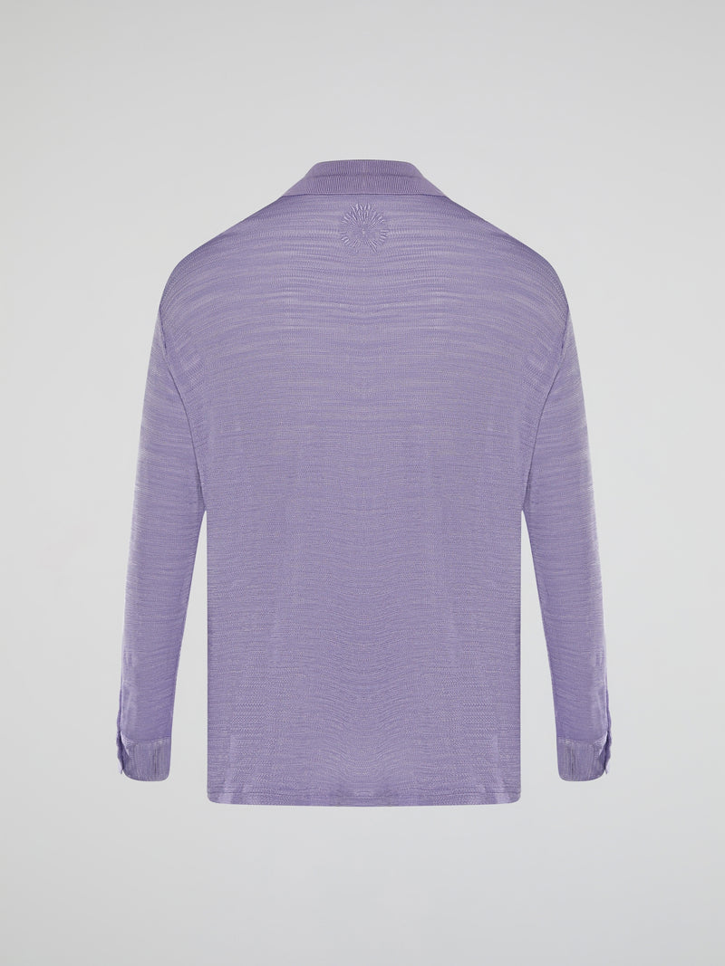 Introducing the Purple Knitted Shirt by Roberto Cavalli, where elegance meets comfort in a seamless blend of style. This luxurious piece features a vibrant hue that showcases your bold personality, while its premium knitted fabric guarantees a heavenly soft touch against your skin. Embrace the epitome of fashion-forward sophistication with this remarkable creation, designed to make heads turn and hearts swoon.