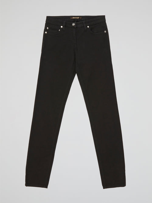 Step into style and unlock a world of sophistication with our Black Straight Fit Jeans by Roberto Cavalli. Crafted from premium quality denim, these jeans seamlessly blend comfort and durability. From casual outings to elegant evening affairs, these jeans effortlessly elevate your fashion game with their sleek, contemporary design.