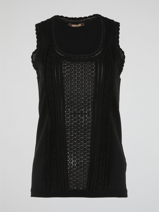 Introducing the exquisite Black Lace Trim Top by Roberto Cavalli, a true embodiment of elegance and sophistication. Crafted with meticulous attention to detail, it features delicate lace detailing that adds a touch of femininity to the classic black design. Whether paired with tailored pants or a flowing skirt, this timeless piece is bound to turn heads and make a lasting impression.