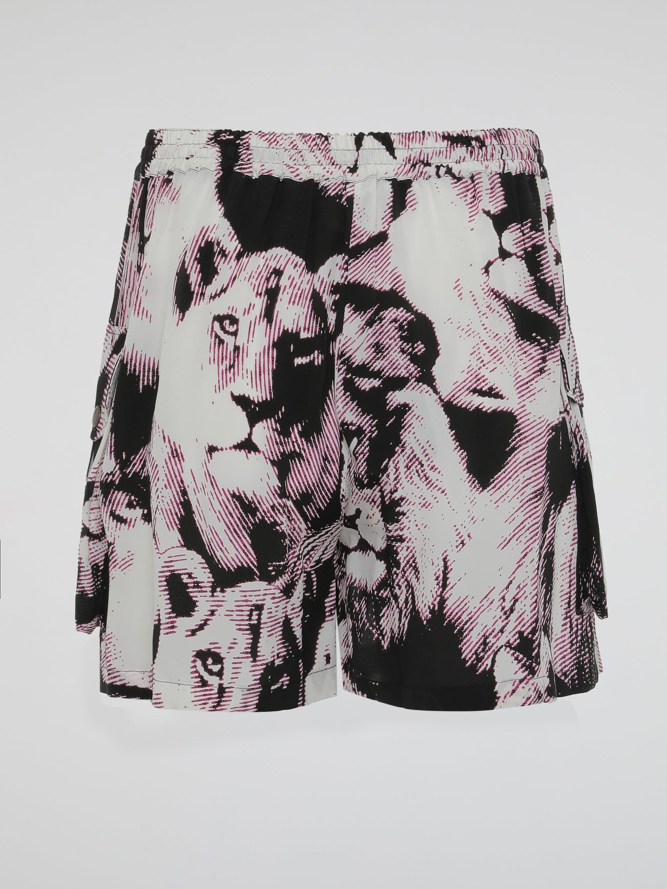 Get ready to unleash your wild side with these Animal Print Drawstring Shorts by Roberto Cavalli. Perfect for the fashion-forward adventurer, these shorts feature a striking animal print pattern that will make you stand out from the crowd. Crafted from high-quality materials, they offer both comfort and style, making them a must-have for any daring fashionista.