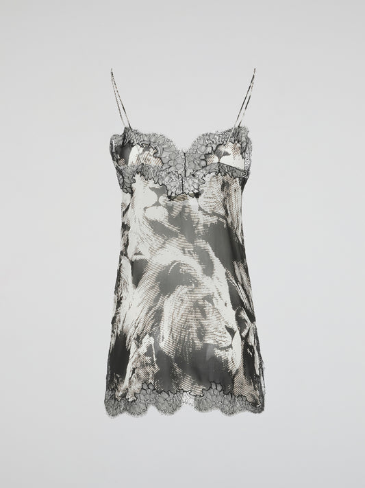 Transform your nights into fierce fashion moments with the Animal Print Lace Trim Night Dress by Roberto Cavalli. This exquisite piece combines the untamed charm of animal patterns with delicate lace details, creating an alluring bedtime ensemble. Embrace your inner seductress and savor the luxurious comfort in this must-have night dress.