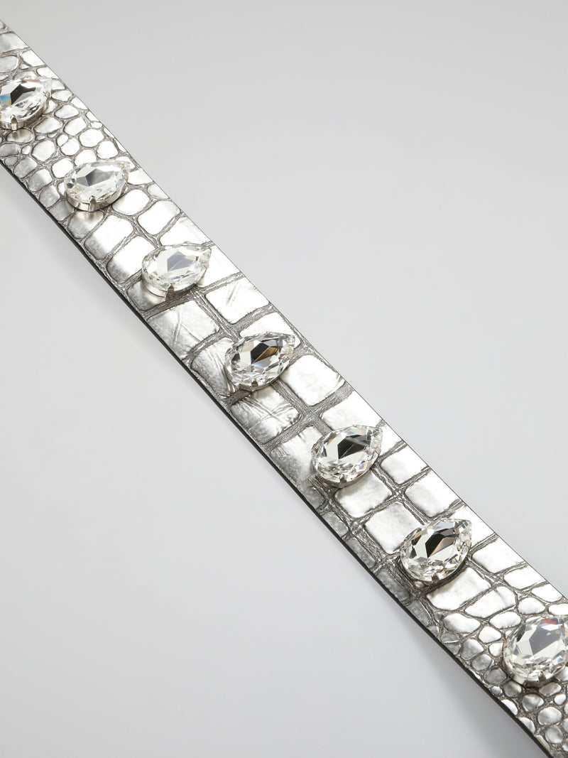 Be prepared to turn heads with the stunning Crystal Embellished Leather Belt by Roberto Cavalli. Crafted from luxurious leather, this belt features sparkling crystals that add a touch of glamour to any outfit. Elevate your style and make a statement with this eye-catching accessory that is sure to make you stand out in a crowd.