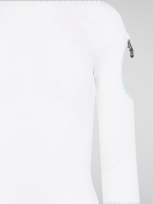 Elevate your everyday wardrobe with this stunning White Cut Out Top from Roberto Cavalli. Crafted from luxurious, high-quality materials, this top features intricate cut out detailing that adds a touch of edge and sophistication to any outfit. Perfect for day or night, this versatile piece is a must-have addition to your fashion collection.