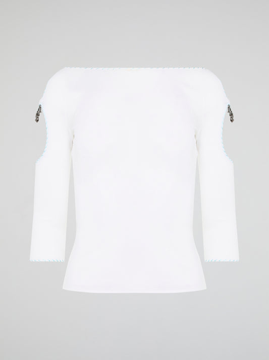 Elevate your everyday wardrobe with this stunning White Cut Out Top from Roberto Cavalli. Crafted from luxurious, high-quality materials, this top features intricate cut out detailing that adds a touch of edge and sophistication to any outfit. Perfect for day or night, this versatile piece is a must-have addition to your fashion collection.