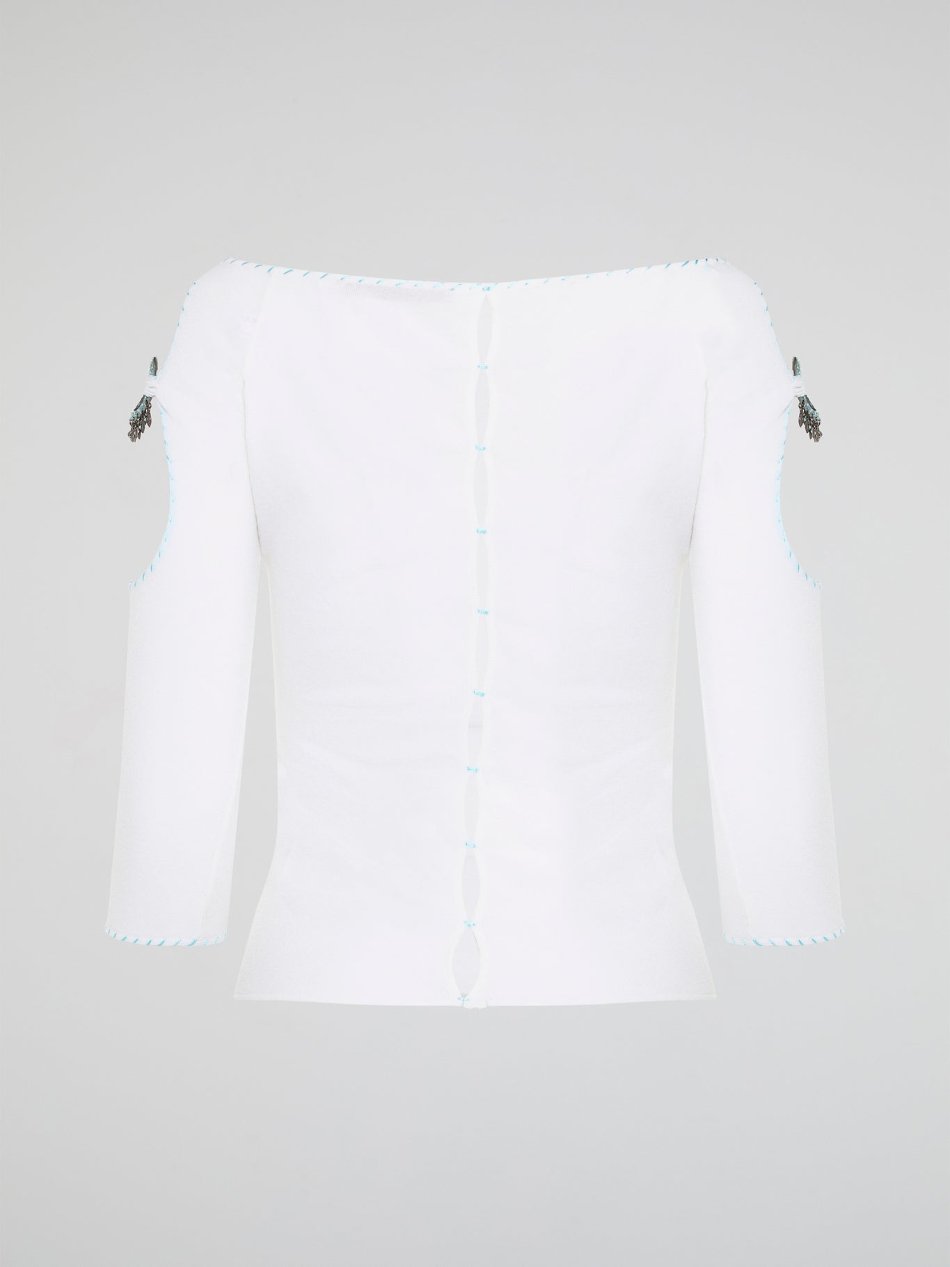 Elevate your everyday wardrobe with this stunning White Cut Out Top from Roberto Cavalli. Crafted from luxurious, high-quality materials, this top features intricate cut out detailing that adds a touch of edge and sophistication to any outfit. Perfect for day or night, this versatile piece is a must-have addition to your fashion collection.