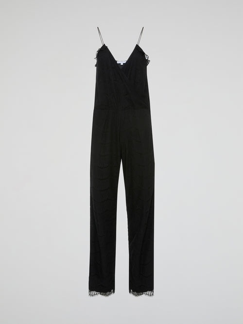 Step out in style and turn heads with our Black Lace Trim Jumpsuit by Joy Cioci. This chic and sophisticated piece features delicate lace detailing that adds a touch of elegance to your look. Whether you're dressing up for a night out or a special occasion, this jumpsuit is sure to make a statement.