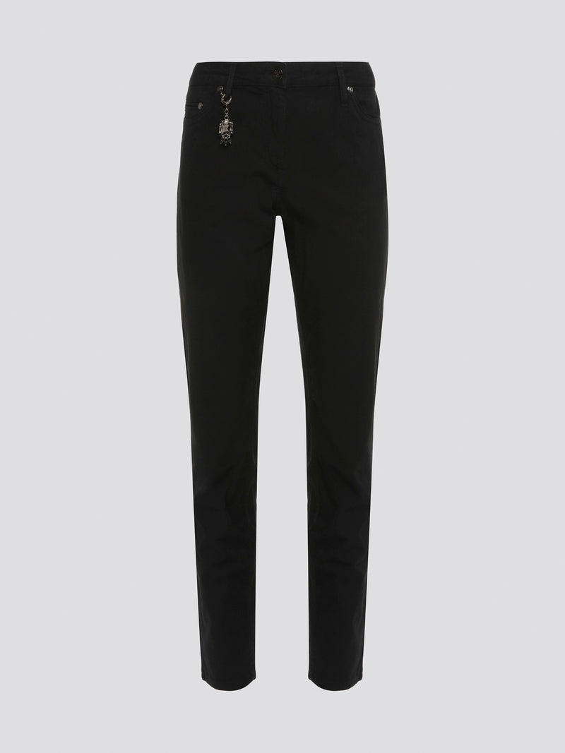 Step out in style with these sleek and versatile Black Skinny Fit Jeans from Roberto Cavalli. Made from premium quality denim, these jeans hug your curves in all the right places while offering unbeatable comfort. Whether dressed up with heels or down with sneakers, these jeans are a must-have for any fashion-forward wardrobe.