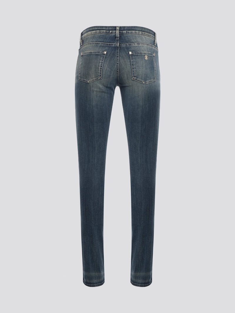 Unleash your inner rockstar with these statement-making Blue Studded Denim Jeans by Roberto Cavalli. The edgy studs add a touch of glamour to the classic denim silhouette, making these jeans a must-have for any fashion-forward individual. Stand out from the crowd and elevate your wardrobe with these show-stopping jeans that are sure to turn heads wherever you go.