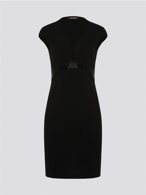 Step into the spotlight and command attention in this stunning Black Embellished Bodycon Dress from Roberto Cavalli. The intricate embellishments and figure-hugging silhouette will have all eyes on you, making you stand out from the crowd at any event. Elevate your wardrobe with this luxurious and unique piece that exudes glamour and confidence.