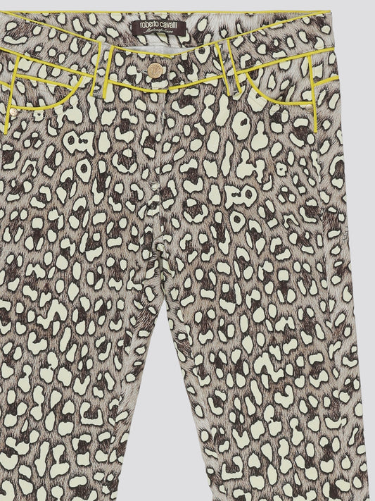 Step into fierce style with these Leopard Print Wide Leg Jeans by Roberto Cavalli. Embrace your wild side with the bold leopard print pattern that is sure to make a statement wherever you go. The wide leg silhouette adds a touch of elegance to these edgy jeans, perfect for a fashion-forward look.