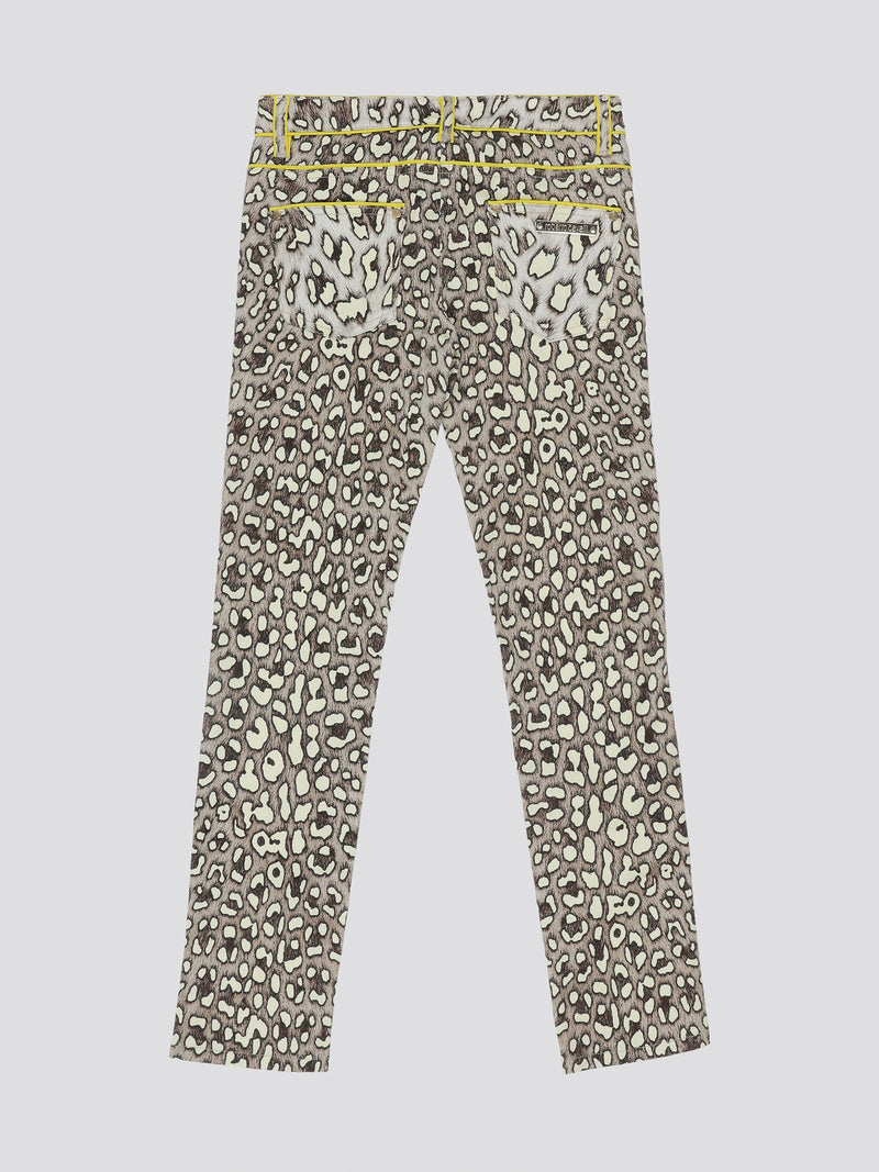 Step into fierce style with these Leopard Print Wide Leg Jeans by Roberto Cavalli. Embrace your wild side with the bold leopard print pattern that is sure to make a statement wherever you go. The wide leg silhouette adds a touch of elegance to these edgy jeans, perfect for a fashion-forward look.