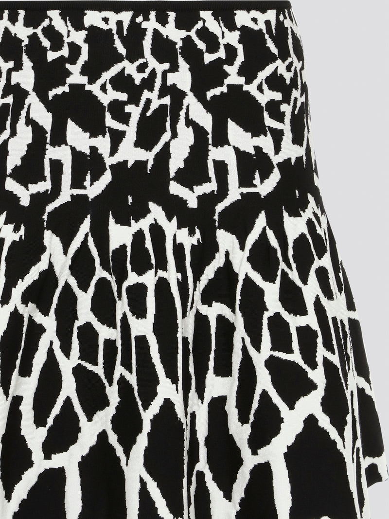 Turn heads with the vibrant and bold Contrast Print Flared Mini Skirt by Roberto Cavalli. The eye-catching design features a mix of geometric patterns and vivid colors, perfect for making a statement. Embrace your playful side and add a touch of luxury to your wardrobe with this unique and stylish piece.