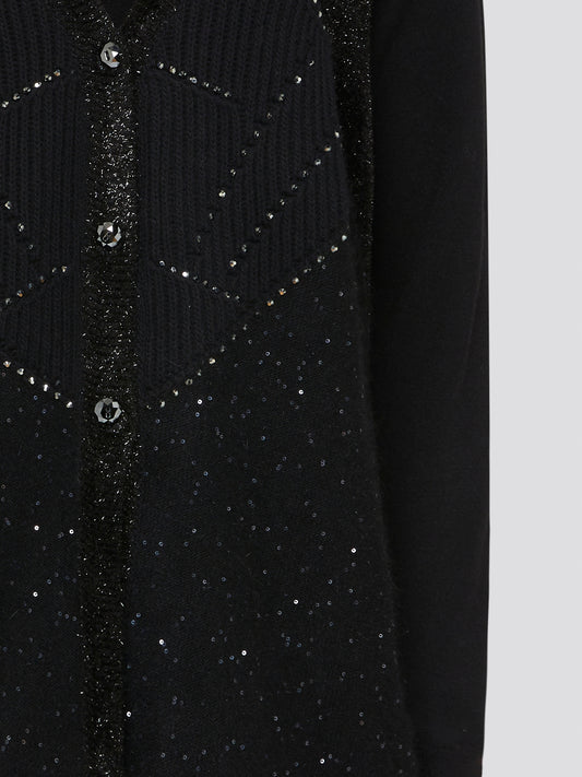 Unleash your inner rockstar with the Black Studded Cardigan V.d.p. Club, the perfect blend of edgy and chic. Made from high-quality materials with intricate studded detailing, this cardigan is a statement piece that will elevate any outfit. Whether you're heading to a concert or a night out with friends, this cardigan will have you turning heads wherever you go.