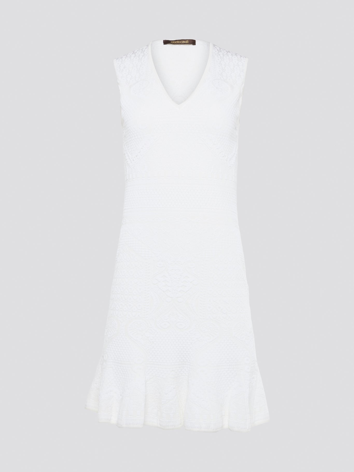 Feel effortlessly chic and sophisticated in this stunning White Sleeveless Mini Dress by Roberto Cavalli. The epitome of Italian luxury, the dress features a flattering silhouette and intricate detailing that is sure to turn heads. Perfect for any occasion, whether it's a summer soirée or a glamorous night out, this dress is a must-have for any fashion-forward woman.