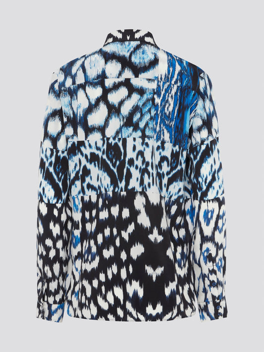 Indulge your wild side with this fierce Animal Print Long Sleeve Shirt from Roberto Cavalli. The striking design is sure to turn heads and make a bold fashion statement. Crafted from luxurious materials, this shirt is not only stylish but also incredibly comfortable to wear.