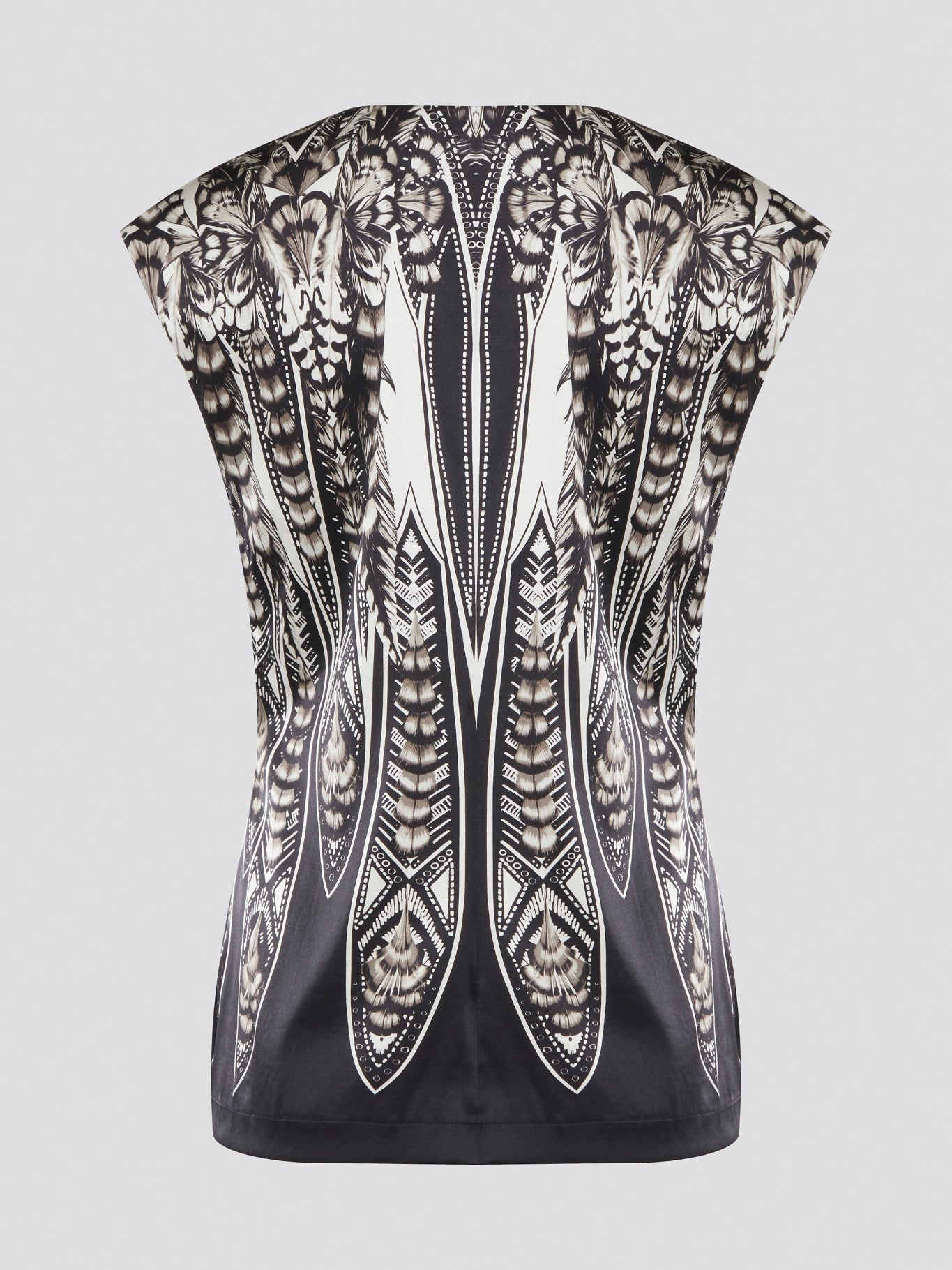 Elevate your summer wardrobe with this effortlessly chic Black Printed Sleeveless Top from Roberto Cavalli. Crafted from luxurious materials, this top features a striking print that is sure to turn heads wherever you go. Pair it with tailored pants for a sophisticated office look, or dress it down with jeans for a casual weekend ensemble.