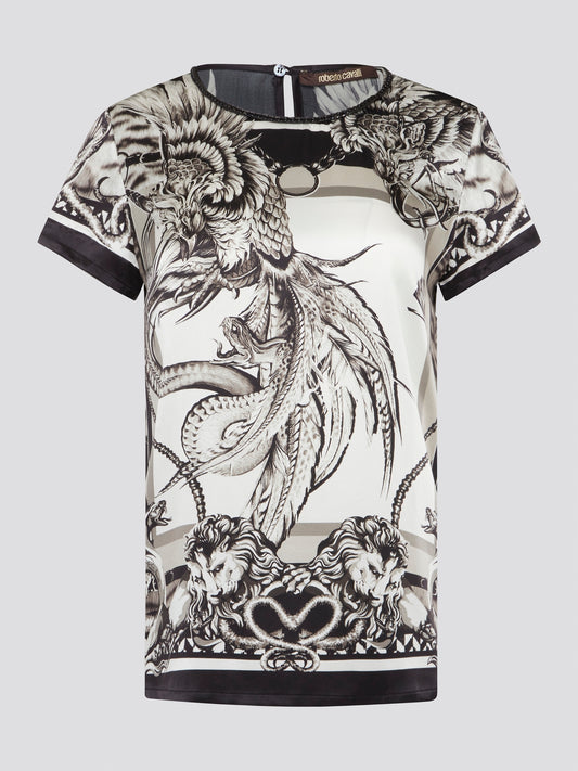 Elevate your everyday look with this Printed Round Neck Top from Roberto Cavalli. Featuring a bold and vibrant print, this top is perfect for making a statement wherever you go. Made with high-quality materials, this top is both comfortable and stylish, making it a must-have addition to your wardrobe.