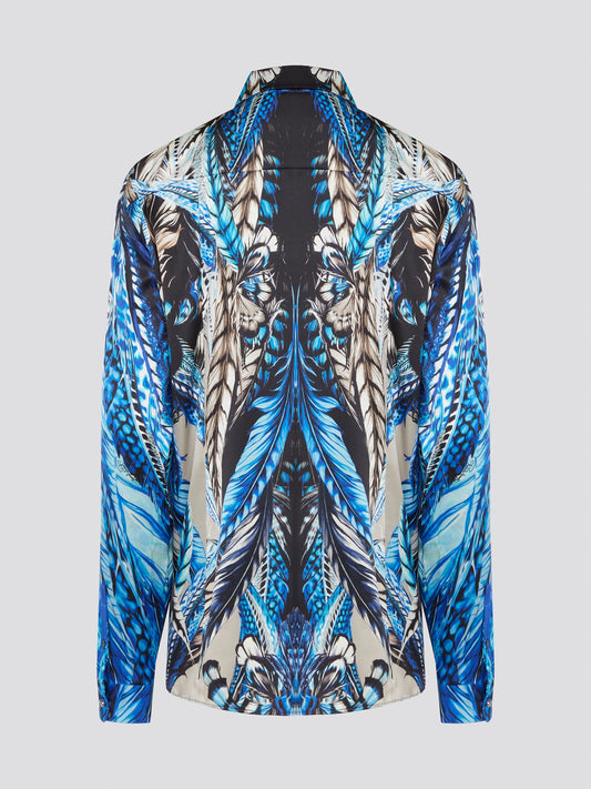 Elevate your wardrobe with the stunning Blue Printed Long Sleeve Blouse by Roberto Cavalli. Featuring a bold and striking print, this blouse is perfect for making a statement wherever you go. Crafted with exquisite attention to detail, this piece will add a touch of luxury and sophistication to any outfit.